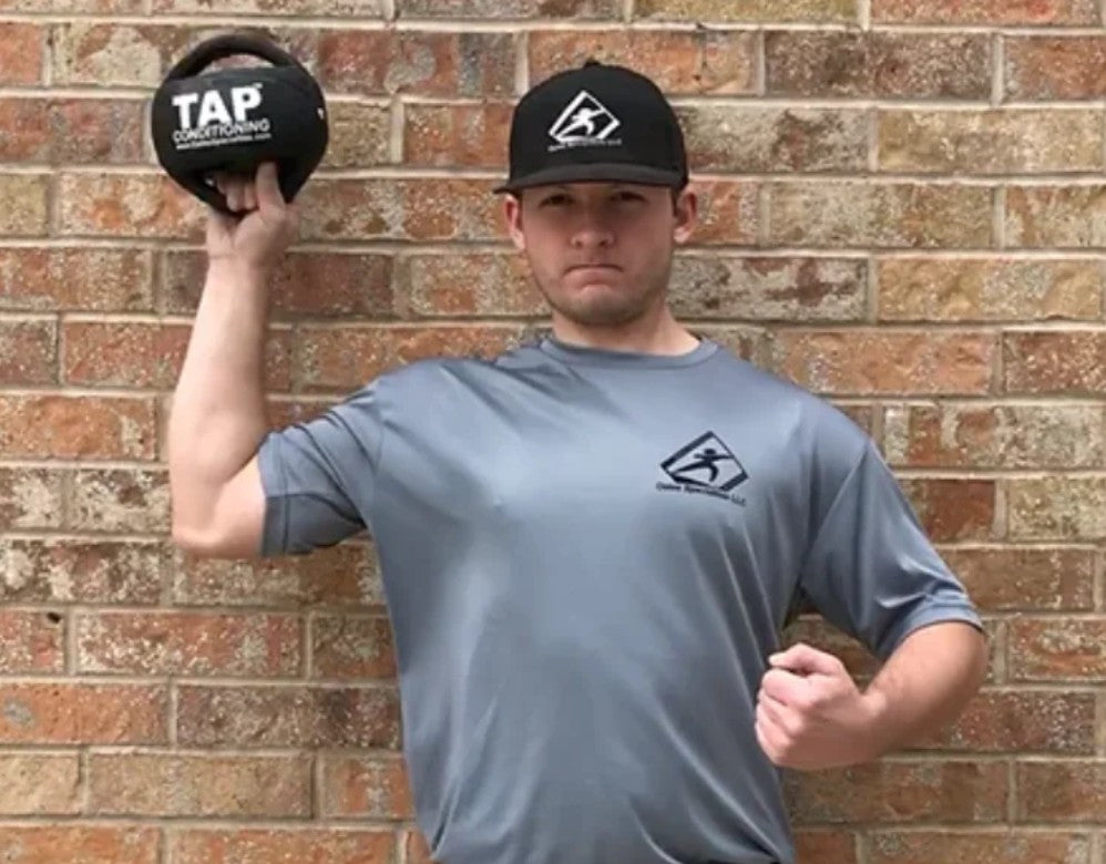 Médecine-ball à double poignée TAP® pour l'entraînement sportif en rotation